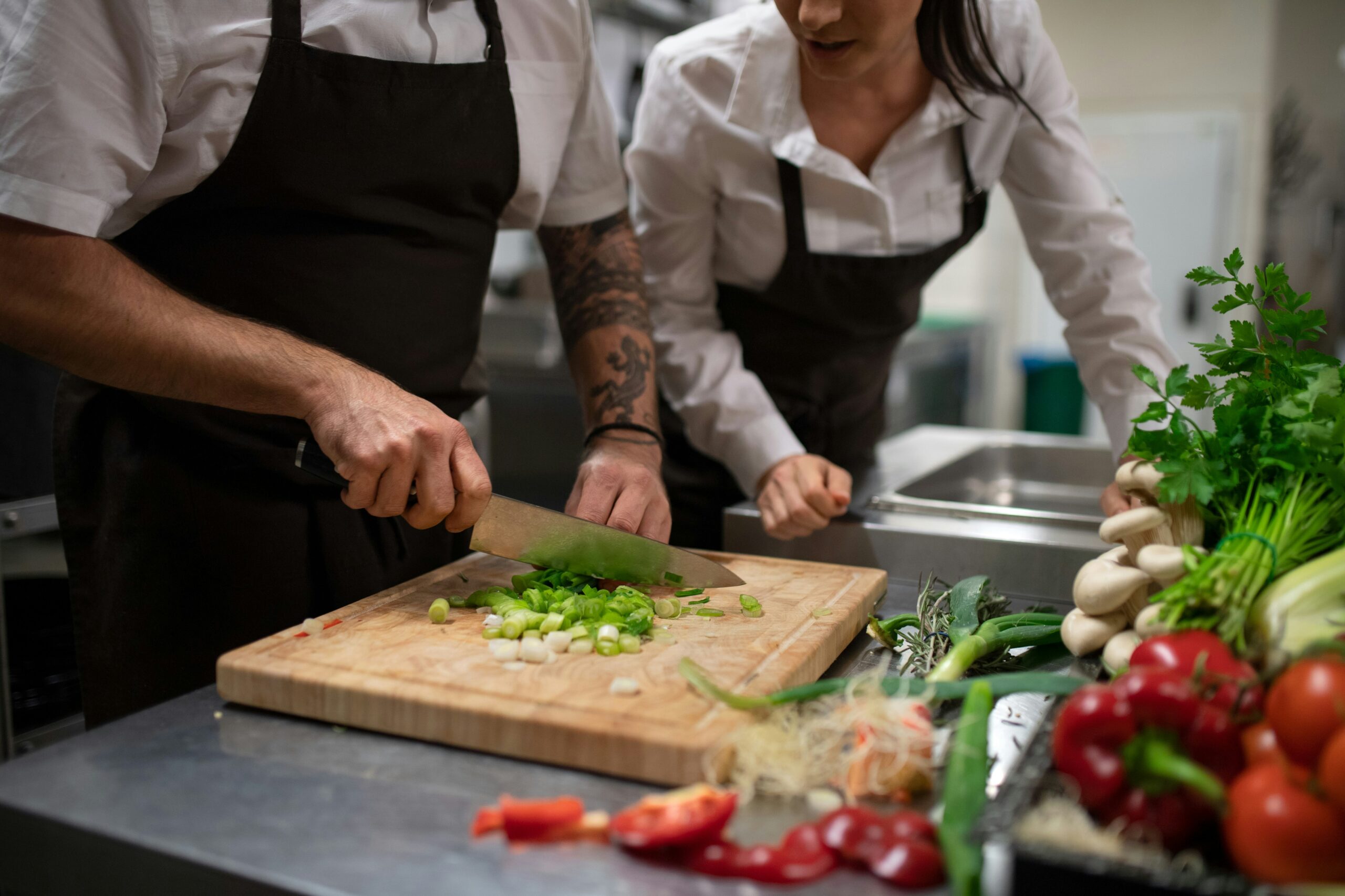 Restaurant chefs preparing an order from Camiles digital ordering system