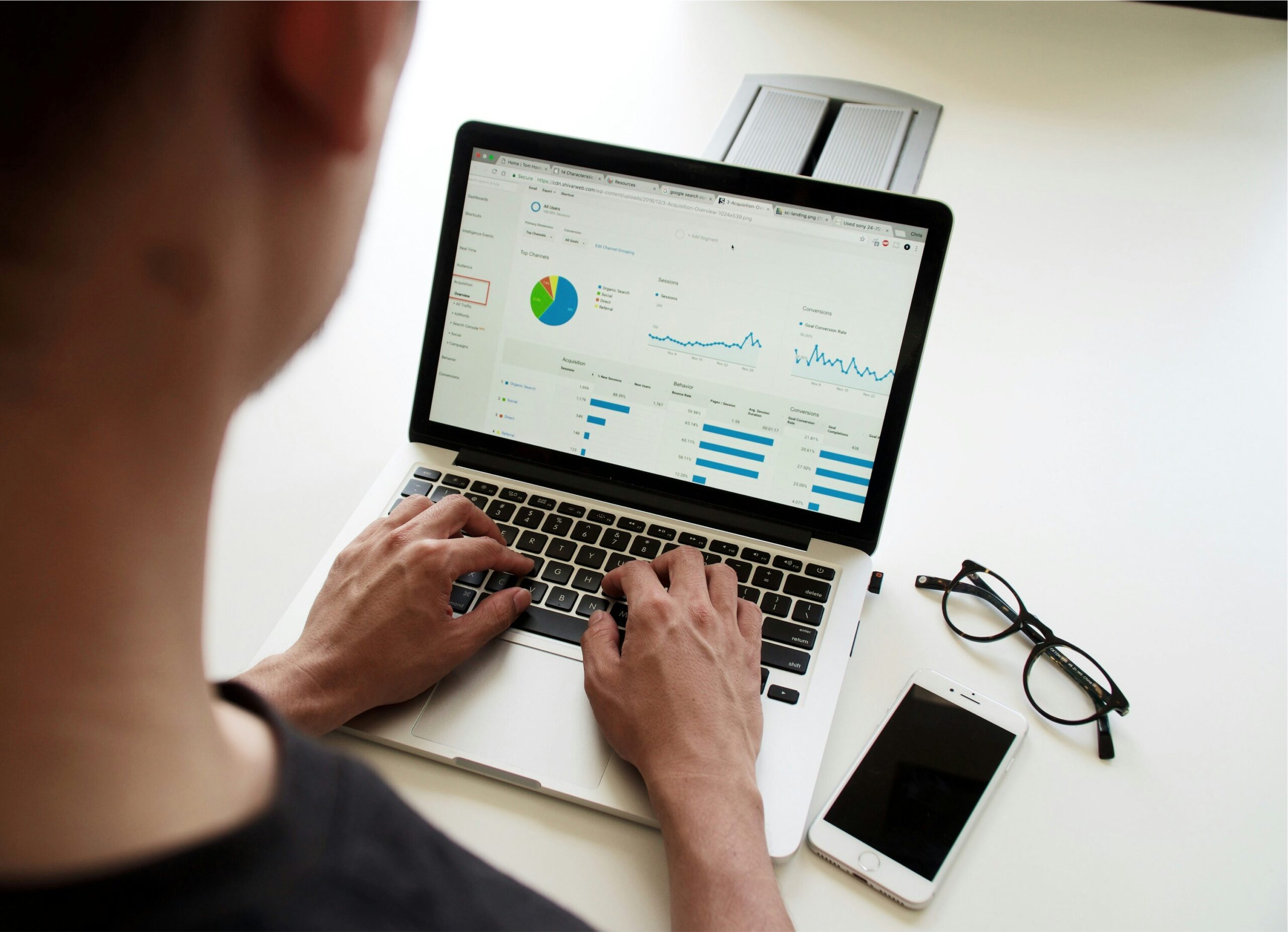 Professional analyzing data on a business intelligence dashboard, showcasing data warehousing and analytics tools